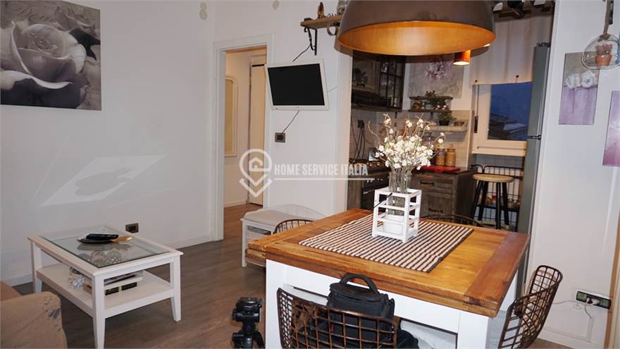 Soggiorno con cucina a vista