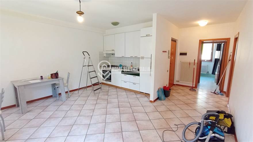 Zona giorno con cucina a vista