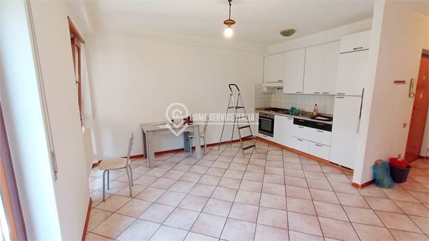 Zona giorno con cucina a vista