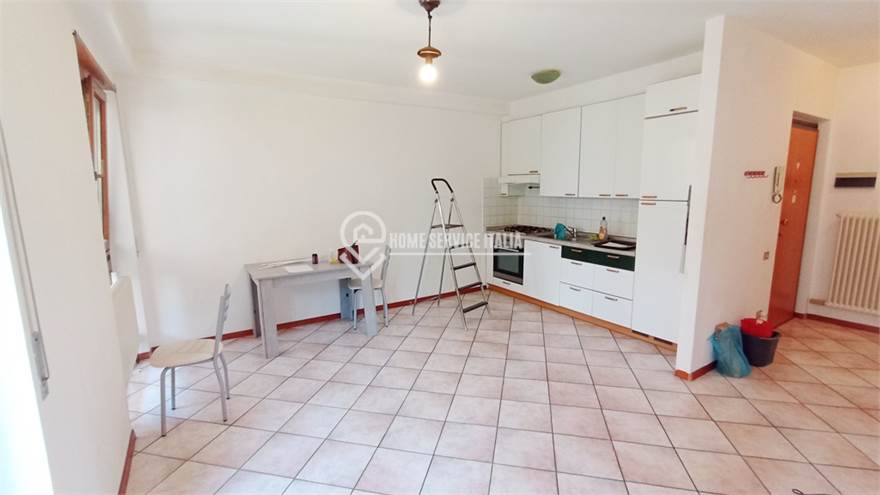 Zona giorno con cucina a vista